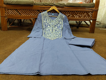  grey embroidered kurta with intricate white threadwork and traditional patterns,