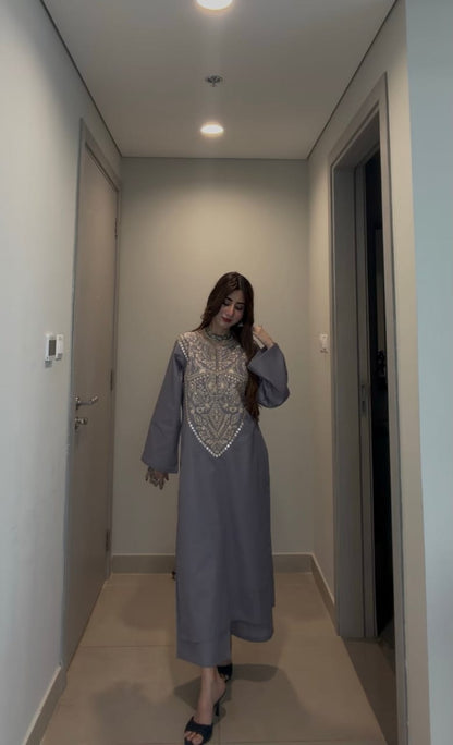 Full-length view of grey embroidered kurta outfit with straight fit, paired with heels for a graceful ethnic look