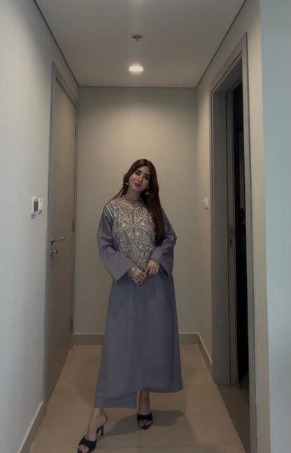 Full-length view of grey embroidered kurta outfit with straight fit, paired with heels for a graceful ethnic look